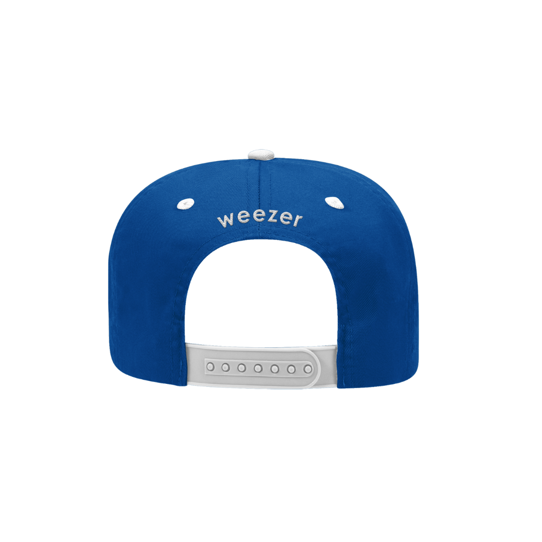 Blue logo hat featuring a blue snapback cap with white embroidered weezer logo and matching white button
