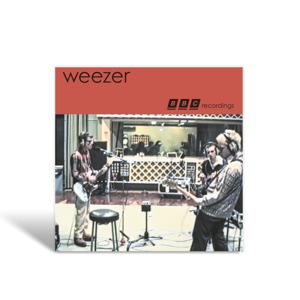 Weezer blue 30th super deluxe vinyl box set album cover showing the band in a warm-lit studio recording sweater song and garage practice