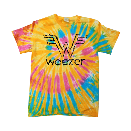 A vibrant yellow, pink, and blue tie-dye t-shirt featuring a black outlined ’w’ logo with the word ’weezer’ printed below it.