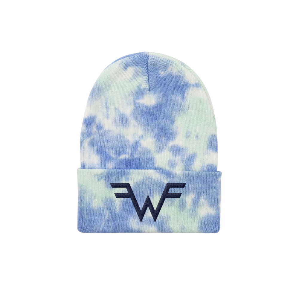A blue and white tie-dyed cuffed beanie knit with a black embroidered wf logo on the cuff